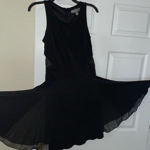 Donna Ricco- little black dress. Sleeveless key hole neck-sheer on waist…